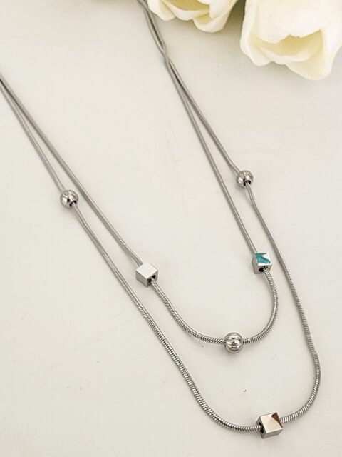 Dorikalı Geometrik Figürlü Çelik Kolye